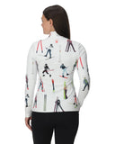 Woman wearing a white jacket with skiing pattern on a white background