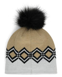 Beige knit beanie with black diamond pattern and black faux fur pom-pom on a white background