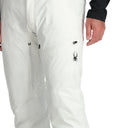 White ski pants with a brand logo on a white background