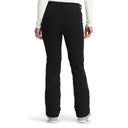 Black snow pants worn by a person on a white background